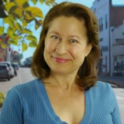 Smiling brunette woman with head tilted